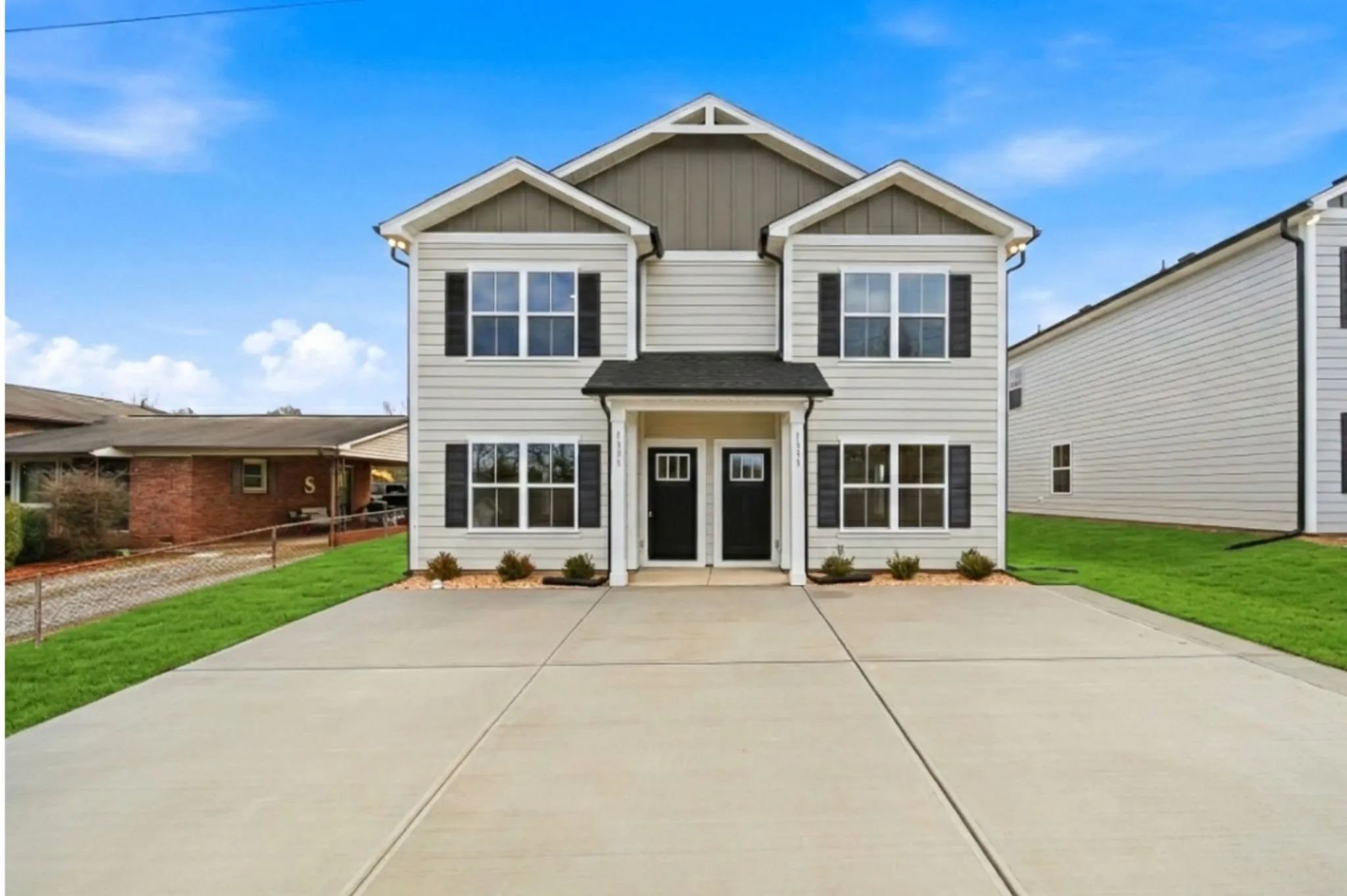 Legacy Signature Rentals townhomes at dusk
